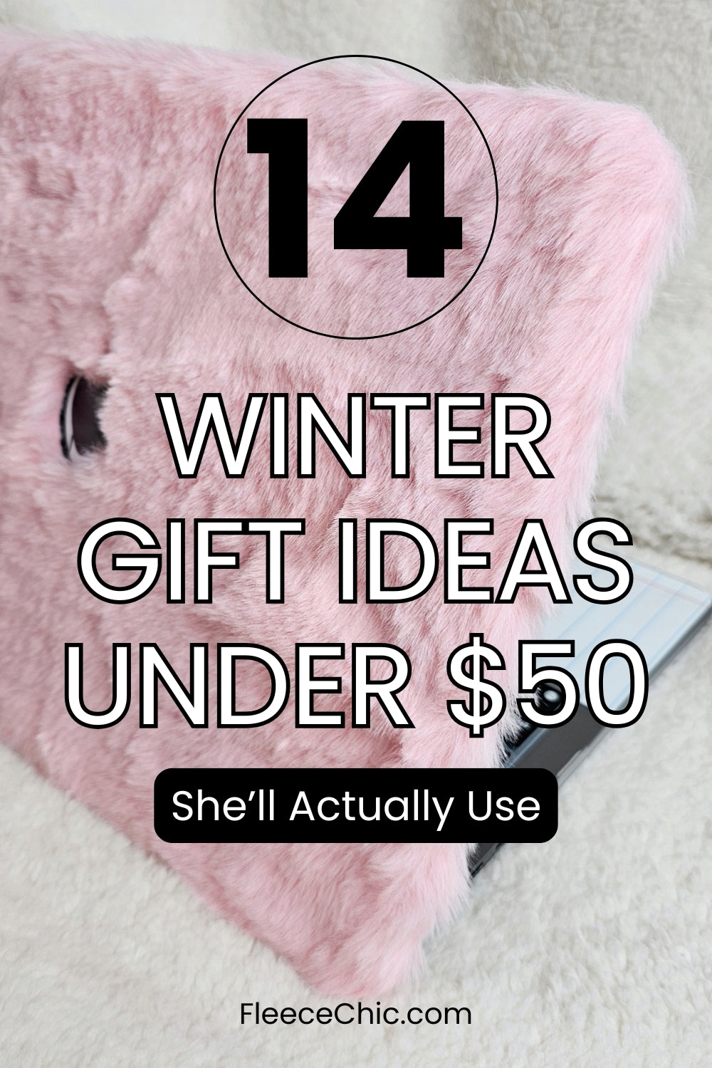 A pink fluffy laptop cover with the text "14 Winter Gift Ideas Under $50 She'll Actually Use" overlaid on top - Blog Cover by Fleece Chic