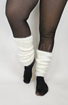 A woman wears ankle warmers with Fleece Chic's viral fleece tights.