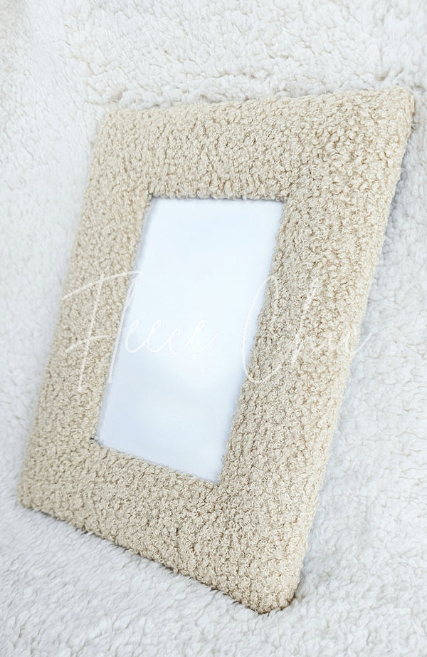A beige colored teddy plush stylish picture frame by Fleece Chic.