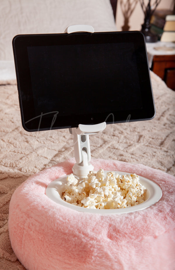 A close-up detail shot of a Tablet Pillow Stand holding a Kindle with popcorn in its bowl - Fleece Chic