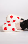 Women's slippers that are perfect for Valentine's Day are white with red hearts - Fleece Chic