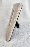 A side view of a stylish picture frame by Fleece Chic made with teddy fleece.