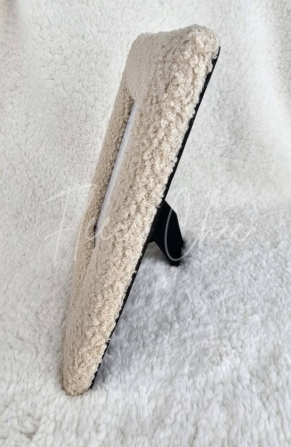 A side view of a stylish picture frame by Fleece Chic made with teddy fleece.