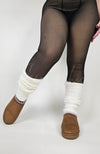 Leg warmers are worn with lined platform slippers and Fleece Chic's viral fleece tights.