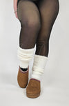 Ankle warmers are paired with Fleece Chic's viral fleece tights and platform slippers.
