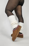Ankle warmers are paired with Fleece Chic's viral fleece tights and lined platform slippers.
