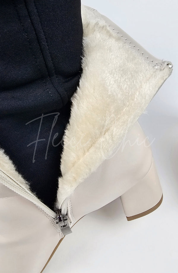 A close-up of the fuzzy interior of a pair of Leather Winter Boots by Fleece Chic.