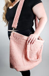 A zippered tote bag by Fleece Chic with the shoulder strap attached.