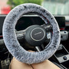 A close up detail shot of a Fuzzy Steering Wheel Cover that is black with light gray tips to look like real fur - Fleece Chic