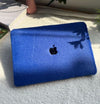 A laptop case cover for MacBooks by Fleece Chic that has a plush exterior and is dark blue.