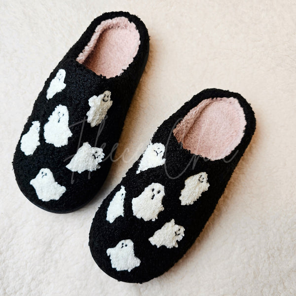Fuzzy slippers with cute ghost motifs by Fleece Chic.