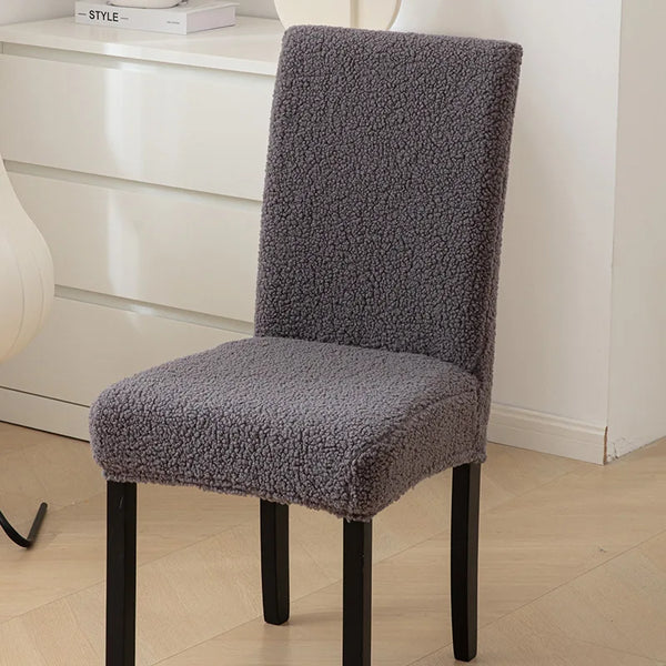 A medium gray sherpa chair cover on a chair - Fleece Chic