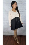 Plush tights that are tan are worn by an Asian woman in a sweater crop top and cute black skirt - Fleece Chic