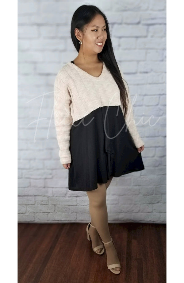Plush tights that are tan are worn by an Asian woman in a sweater crop top and cute black skirt - Fleece Chic
