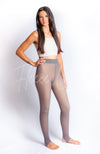 Gray pantyhose leggings with a warm plush lining that are footless are worn by a woman in a white crop top - Fleece Chic