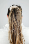 A woman wears her hair in a ponytail with a Fluffy Scrunchie - Fleece Chic