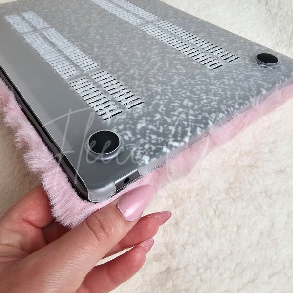 A bottom view of a MacBook in a laptop cover that is ultra plush by Fleece Chic.