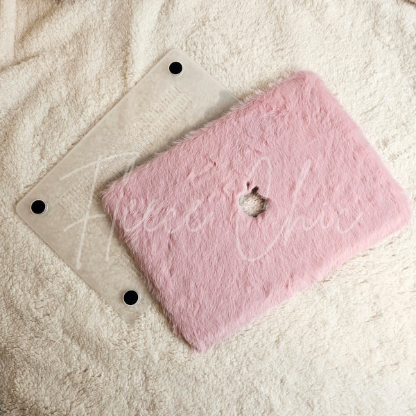A laptop cover that is ultra plush rabbit faux fur by Fleece Chic on a white sherpa background.