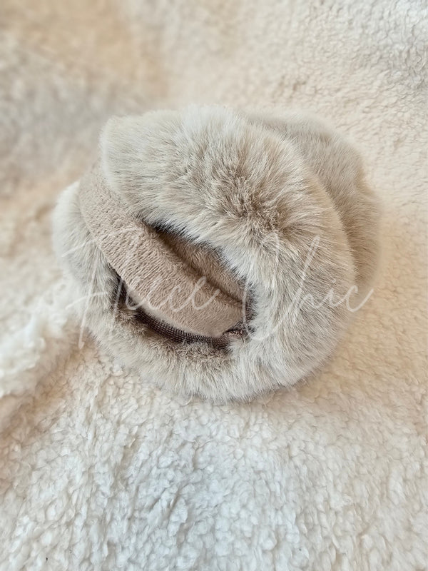 A close up detail shot of fur earmuffs by Fleece Chic.