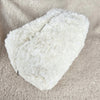 A close-up of a closed sherpa bag that has a flower lining - Fleece Chic