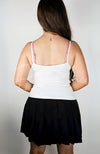 The backview of a twirl skirt and a thermal tank by Fleece Chic
