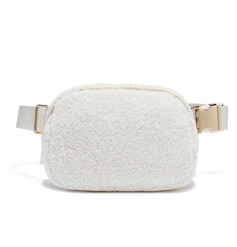 A white teddy hip bag with gold clasp by Fleece Chic.