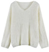 A fuzzy sweater that is white with a v neckline on a white background - Fleece Chic