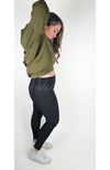 The profile view of a pair of cozy leggings by Fleece Chic paired with the top of their Effortlessly Chic Tracksuit.
