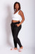 An African American Woman wearing cozy leggings with pockets and cozy slides by Fleece Chic.