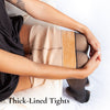 Fleece tights with a thick lining have their fluffy interior displayed - Fleece Chic