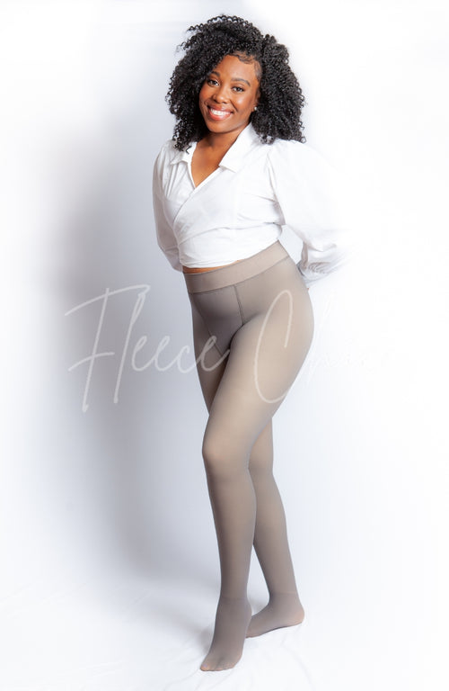 Opaque tights with a fleece lining are worn by an African American woman in a white blouse - Fleece Chic