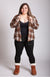 A woman smiles and poses in an insulated flannel that is brown and is paired with a winter camisole, winter leggings, and brown fur lined winter boots - Fleece Chic