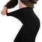 Opaque tights plus size with fleece lining in black color are worn by a woman who is demonstrating their stretchability - Fleece Chic