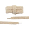 Close-up detail of a pair of wide shoelaces that are beige and fuzzy - Fleece Chic