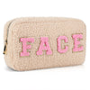 Beige travel pouch by Fleece Chic with letters spelling out the word "face."