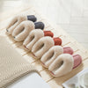 House slippers that have a fleece lining and faux fur collar are lined up together to display their colors - Fleece Chic