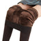 Brown tights with fleece that are opaque have their waist folded down to show off their soft fuzzy lining - Fleece Chic
