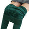 Green tights that are perfect for winter are worn by a woman who is showing off their soft inside - Fleece Chic