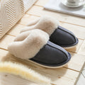 Faux fur slippers that're dark gray with a plush lining are displayed - Fleece Chic