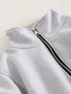 A close up of a gray fleece sweatshirt with high collar - Fleece Chic