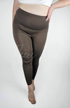 A woman wears brown yoga leggings that have a fleece lining - Fleece Chic