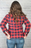 Insulated flannel shirt that is perfect for winter with its plush lining has its backside displayed - Fleece Chic