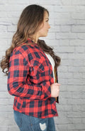 Long sleeve flannel with fleece lining is worn by a woman with long brown hair - Fleece Chic