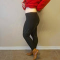 Fleece lined pants with a sherpa lining have their high waist design displayed - Fleece Chic