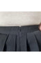 A twirl skirt has its back zipper displayed - Fleece Chic