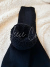 A black pair of boot socks with one rolled down inside out - Fleece Chic