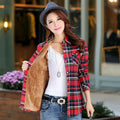 Long sleeve flannel that is red, yellow, and green with soft lining is worn by a woman in a gray hat - Fleece Chic
