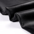 Thermal leather leggings with a fleece lining have a close up looking at their outside material - Fleece Chic
