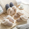 House slippers that have a fleece lining and faux fur collar are displayed together to show-off their colors - Fleece Chic